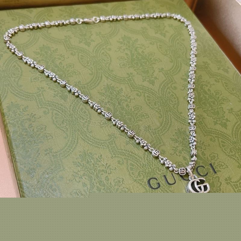 G*u*i necklaces